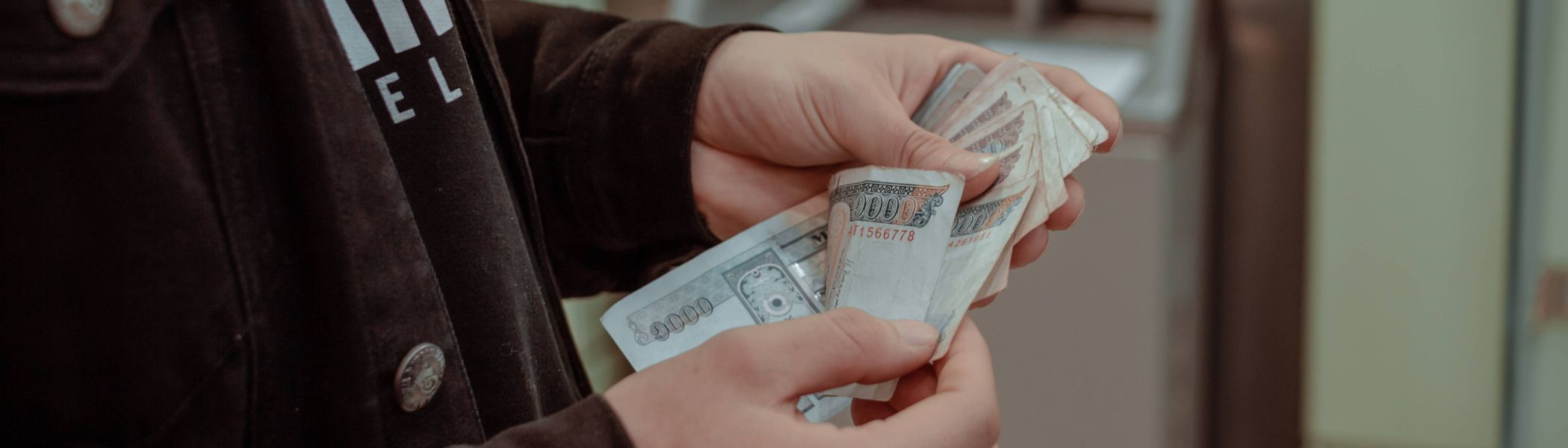 Person counting money