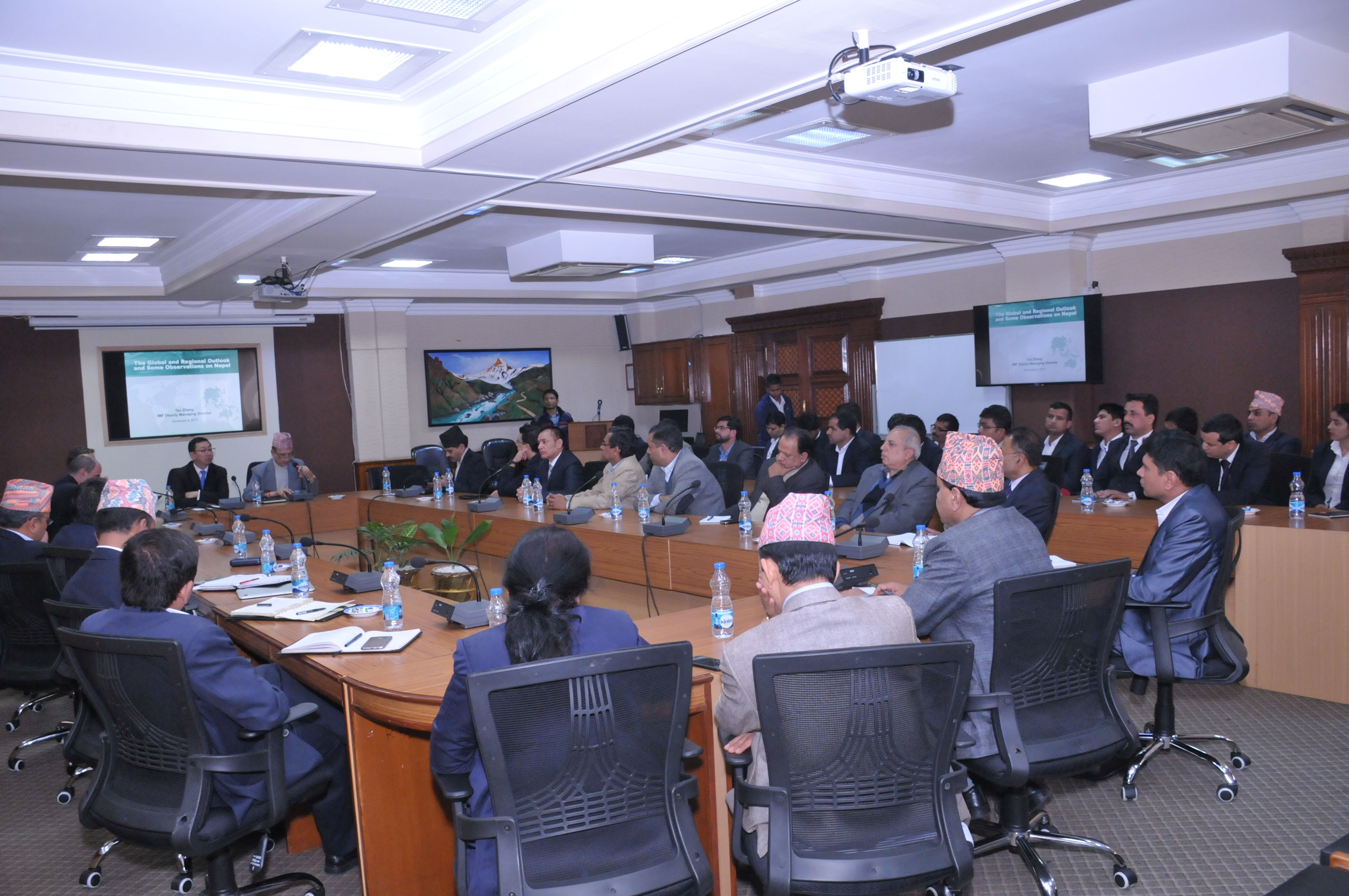DMD Zhang delivering a presentation in an interactive session with authorities and representatives of business association and academia. 