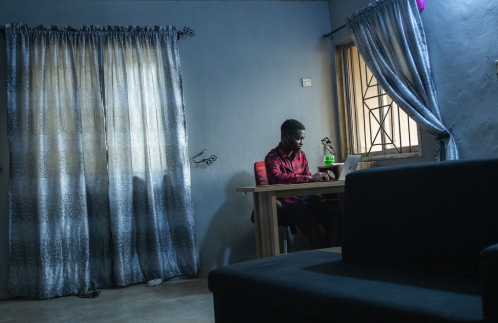 Lagos, Nigeria. Wole Olayinka, a 27 years old communications professional has been working from home since the break of the pandemic in Lagos.
