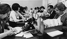Employees do paperwork at the brokerage house of Merrill Lynch, Pierce,
Fenner & Smith, New York, United States,1965.