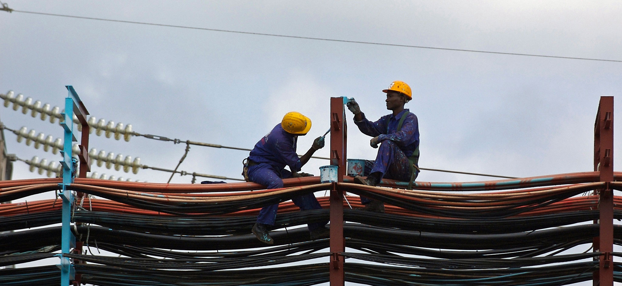 Workers maintain a thermal power station in Ghana. © Jonathan Ernst/World Bank